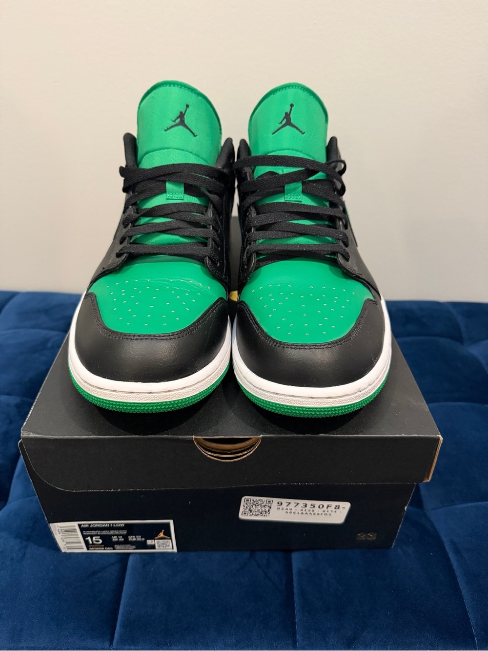 Jordan 1 Low Black and Lucky Green
